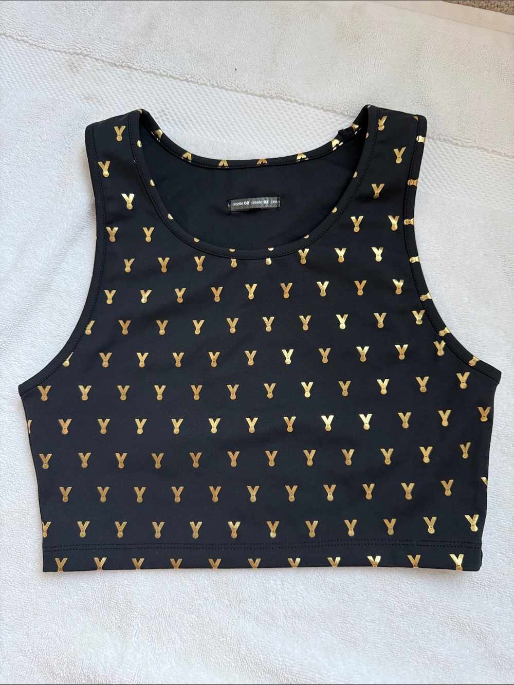 Oiselle women’s Black with Gold Medals Crop Top